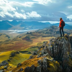 Travel Adventures: Exciting image of a person exploring a breathtaking mountain landscape, inspiring wanderlust.