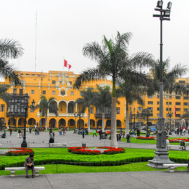 LIMA, PERU - AUGUST 21, 2006: Main Square - Plaza de Armas (Plaza Mayor) of Lima, Peru with the Municipal Building in the background.