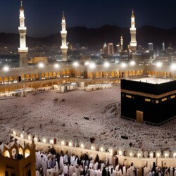 A night view of the Kaaba, the holiest site in Islam, located in Mecca, Saudi Arabia. The image captures the beauty and grandeur of this sacred place and the immense number of Muslim pilgrims who have gathered to perform the Hajj.